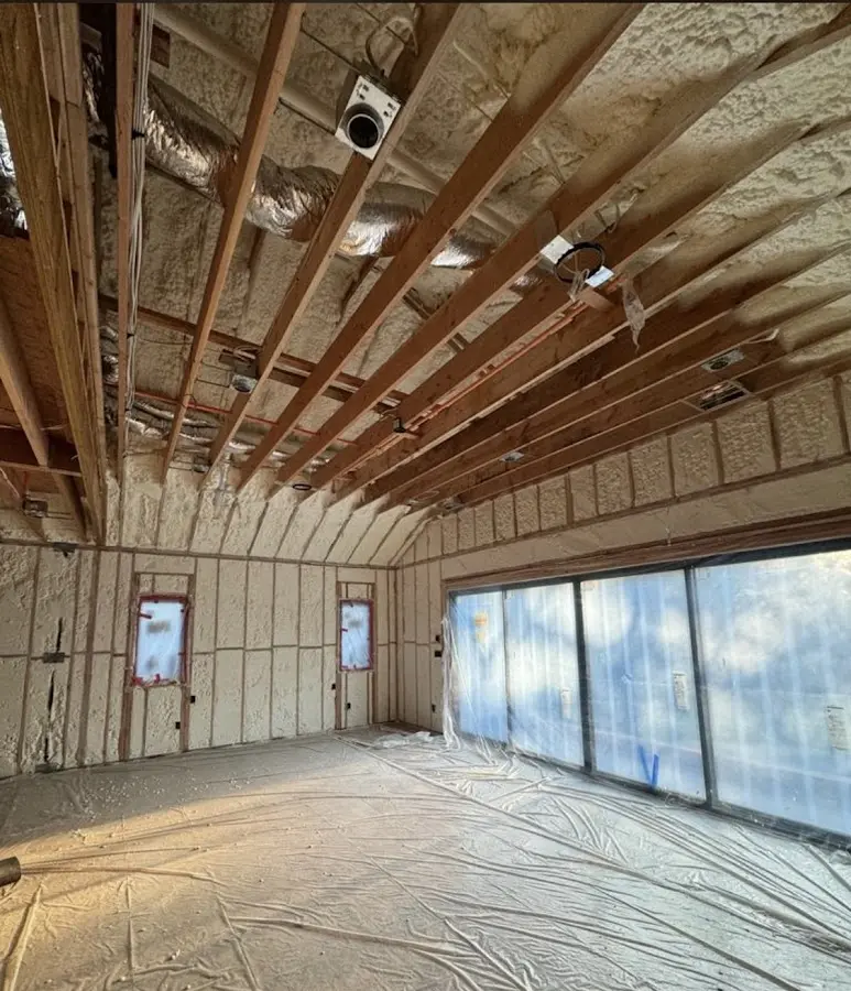 Interior walls and ceiling insulated with spray foam during new construction in Apollo Beach